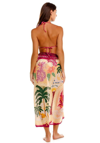 Zinna Thamar Sarong by Agua Bendita, featuring a beautiful tropical placement print, worn as a back view cover-up.