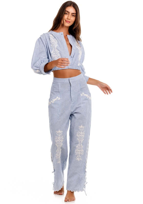 Oprah Batik Beach Trousers by Agua Bendita, featuring a chic wide-leg silhouette with striped fabric and embroidered patterns.