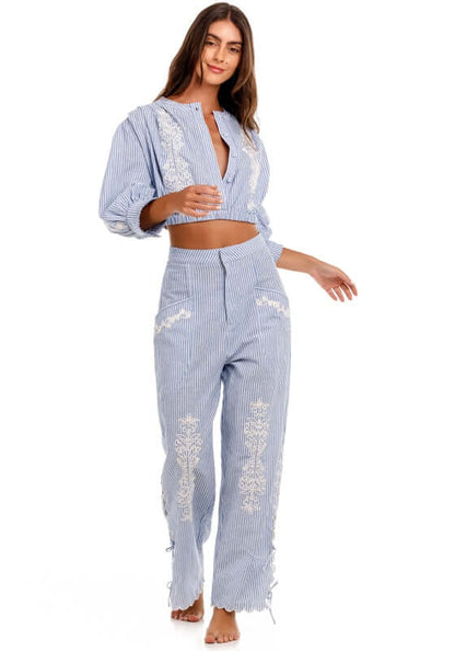 Oprah Batik Beach Trousers by Agua Bendita, featuring a chic wide-leg silhouette with striped fabric and embroidered patterns.