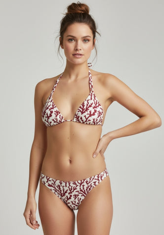 Eva Triangle Bikini Top Deep Coral by Alicia Swim model wearing a stylish bikini in deep coral with coral pattern design.