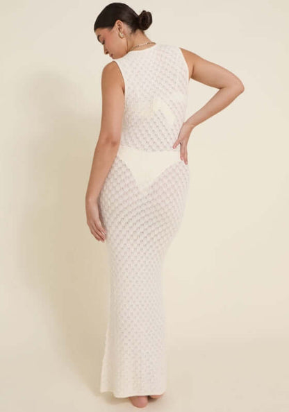 Dominica Dress Ivory by Away That Day, showcasing the back view of a crochet maxi dress with intricate detailing.