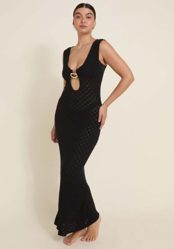 Dominica Dress Black by Away That Day, featuring intricate crochet, keyhole cutout, and elegant gold accents.