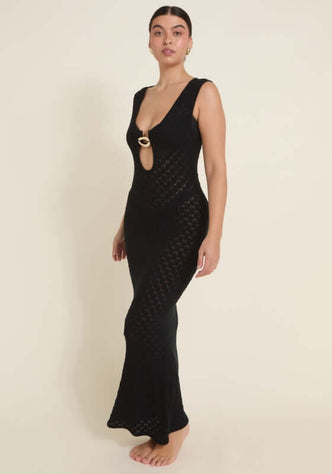 Dominica Dress Black by Away That Day, showcasing a crochet maxi with a front keyhole cutout and gold accents.