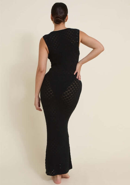 Dominica Dress Black by Away That Day, showcasing back view and crochet detailing of a stunning black maxi dress.