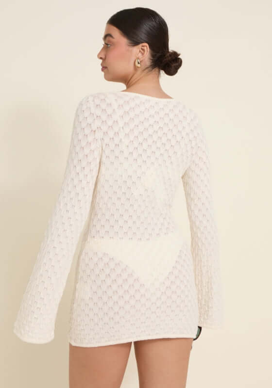 Havana Dress Ivory by Away That Day, featuring a back view, bell sleeves, and a textured design.