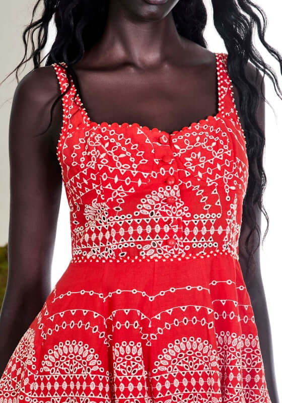 Winnie Dress Red Nelum by Charo Ruiz, featuring a close-up of the embroidered linen bodice and wide straps.