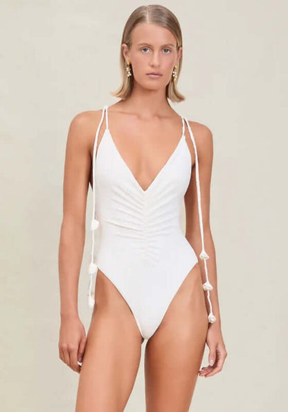Carmela Swimsuit Dove by Devon Windsor, elegant white one-piece with V-neckline and ruched bodice.