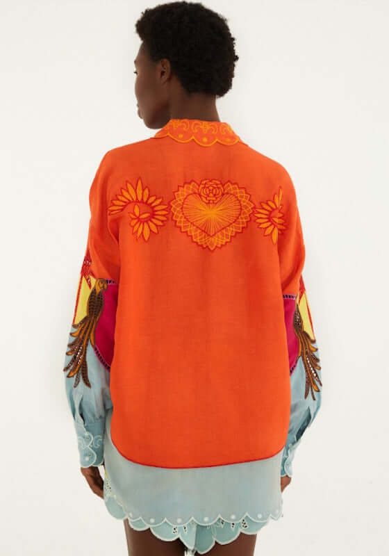 Usiacuri Embroidered Richelieu Shirt by Farm Rio showing vibrant orange back with intricate floral and heart embroidery.