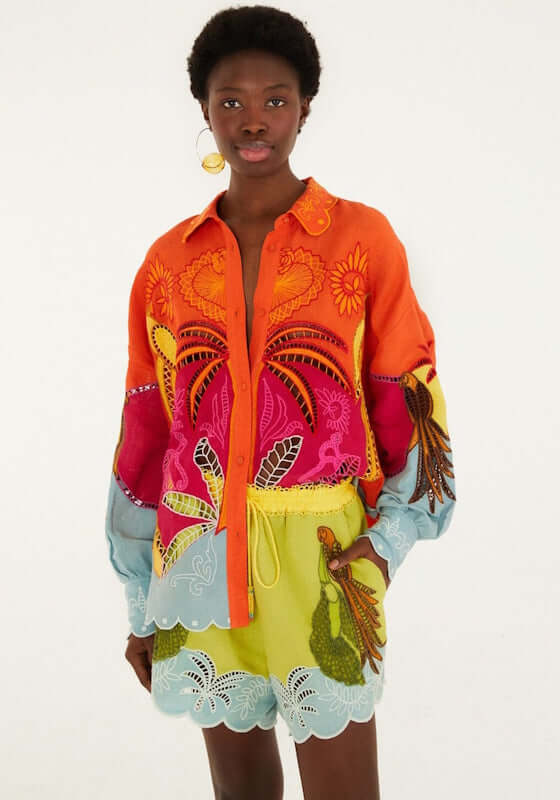 Usiacuri Embroidered Richelieu Shorts by Farm Rio featuring vibrant green fabric, tropical embroidery, and a playful scalloped hem.