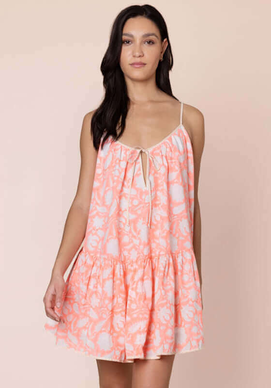 Pomegranate Strappy Mini Dress Neon Red by Juliet Dunn, featuring adjustable straps and a breezy fit in poplin fabric.
