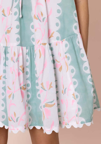 Bird Of Paradise Strappy Mini Dress Pistachio by Juliet Dunn, featuring a patterned hem and floral details.