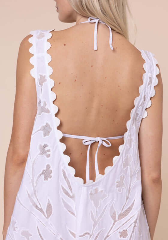 Floral Cutwork Low Back dress White by Juliet Dunn showcasing the delicate scalloped trim and cutout back.