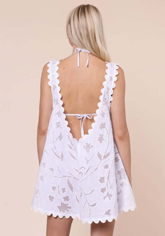 Floral Cutwork Low Back dress White by Juliet Dunn, showcasing the scalloped trim and delicate cutwork detailing on the back.