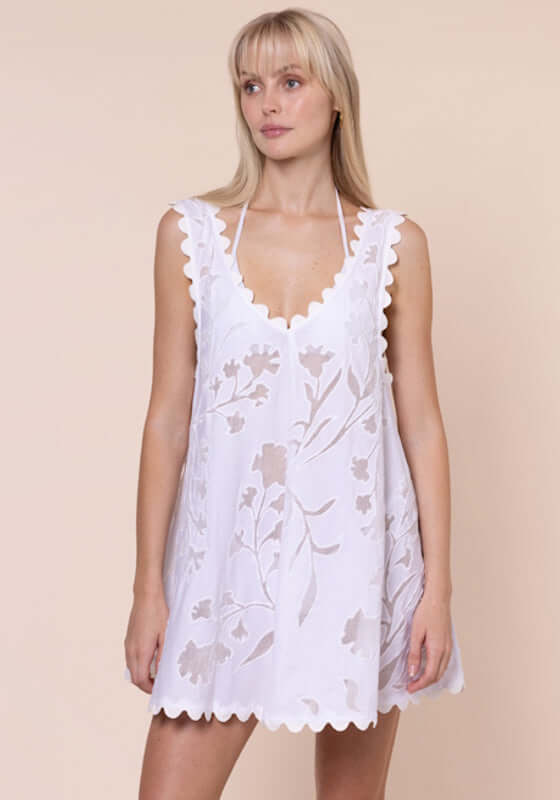 Floral Cutwork Low Back dress White by Juliet Dunn, showcasing a white cotton mini beach dress with floral cutwork details.
