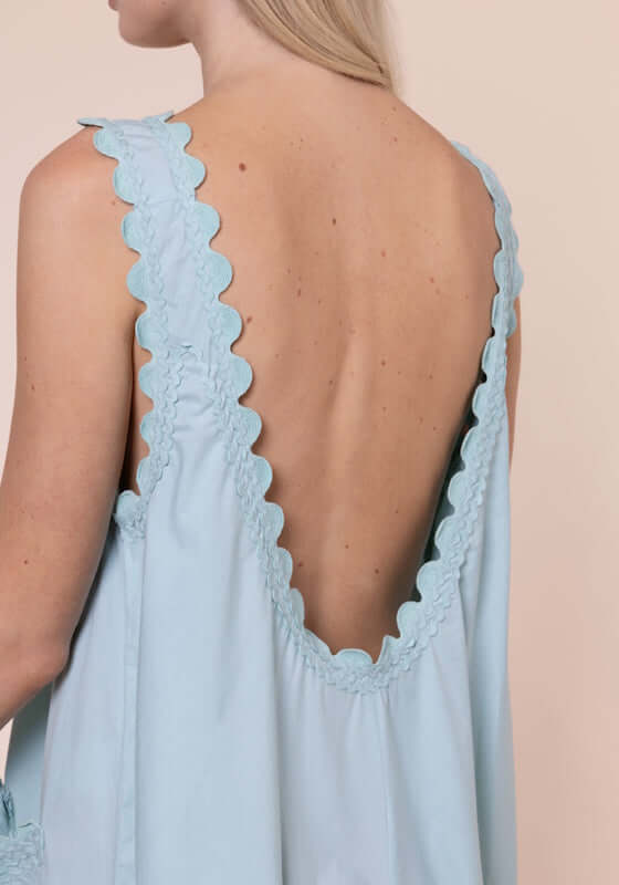 Ric Rac Low Back Dress Pistachio by Juliet Dunn, showcasing the scalloped low back detail of the dress in soft cotton.