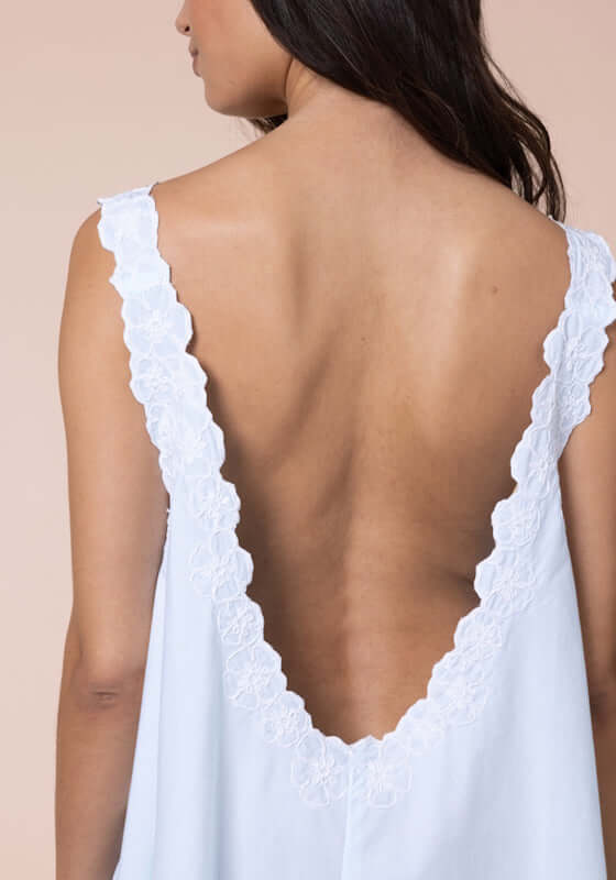 Poplin Floral Low Back Dress Ice Blue by Juliet Dunn, showcasing an elegant low back and intricate lace trim.