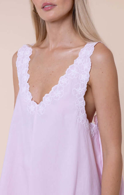 Poplin Floral Low Back Dress Petal Pink by Juliet Dunn, featuring a delicate lace trim on a soft pink fabric.