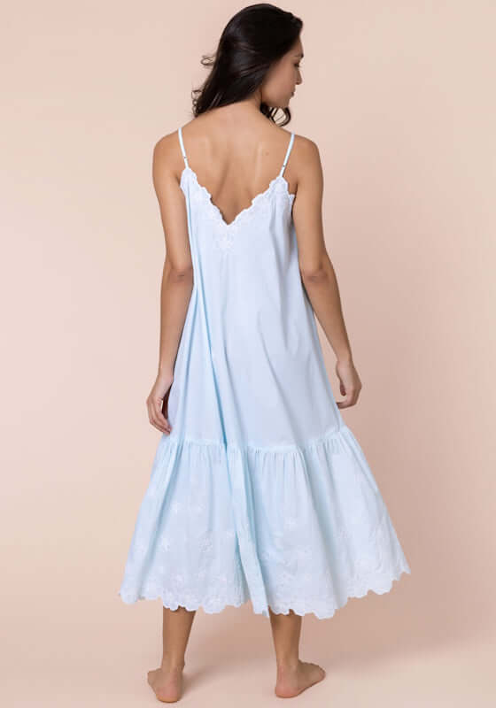 Poplin Floral Midi Dress Ice Blue by Juliet Dunn, showcasing a relaxed fit with floral embroidery and a V-neckline.