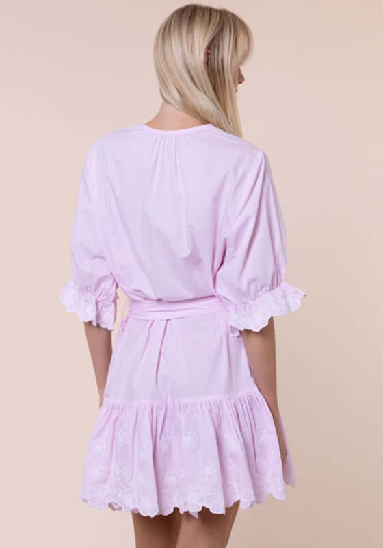 Poplin Floral Tie Waist Dress Petal Pink by Juliet Dunn. Back view of the dress showcasing its ruffled hem and tie waist.