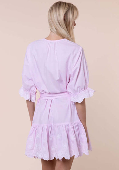 Poplin Floral Tie Waist Dress Petal Pink by Juliet Dunn. Back view of the dress showcasing its ruffled hem and tie waist.