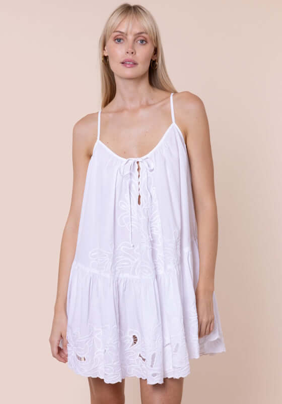 Poplin Strappy Dress White by Juliet Dunn, showcasing a model in an elegant white poplin dress with embroidered details.