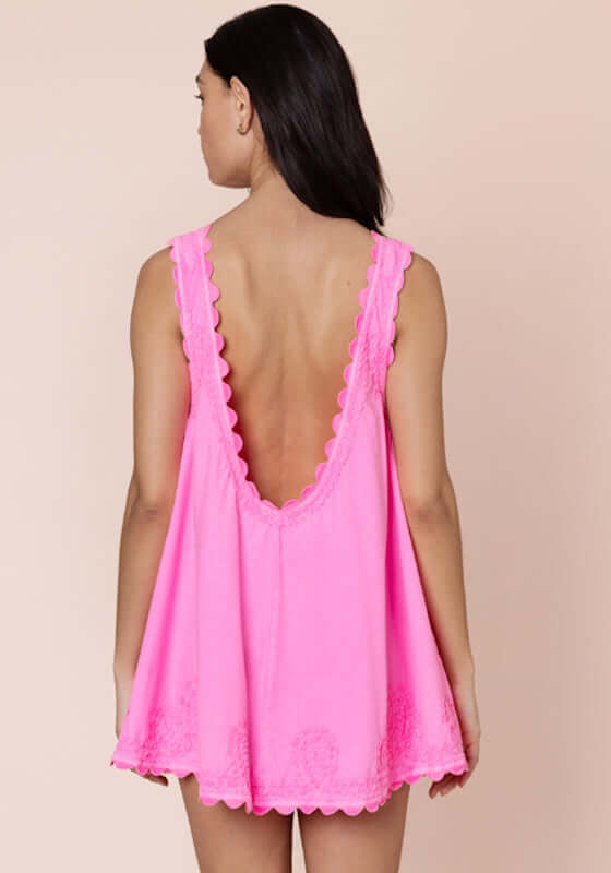 Ric Rac low Back Dress Hot Pink by Juliet Dunn, showcasing a stylish low back design in vibrant pink fabric.