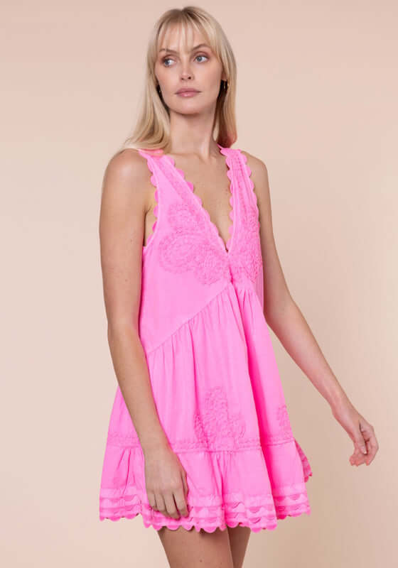 Ric Rac V Neck Dress Hot Pink by Juliet Dunn, showcasing a stylish V neckline and playful ric rac details.
