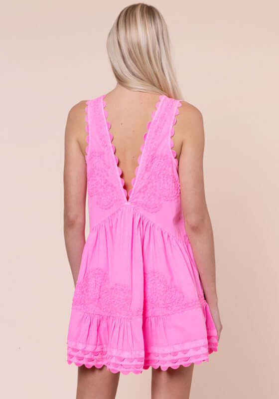 Ric Rac V Neck Dress Hot Pink by Juliet Dunn, showcasing the back view with scalloped detailing in vibrant hot pink.