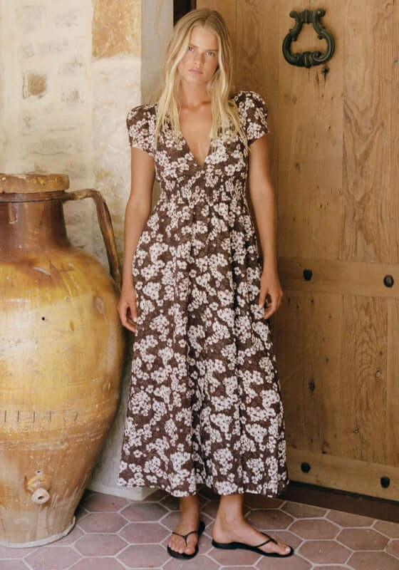 Vacation Midi Dress Florentine by Peony worn by model, featuring a V-neckline and floral pattern.