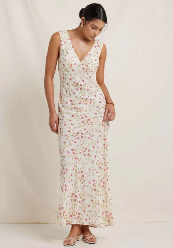 Keepsake Maxi Dress Sweet Pea by Peony, featuring a V-neckline, crossed-back design, and floral print for elegant occasions.
