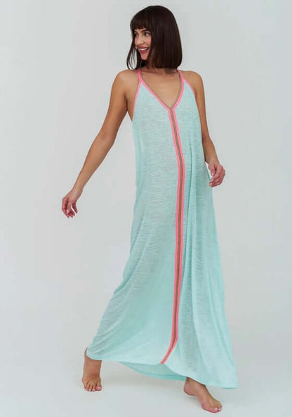 Inca Maxi Sun Dress Aqua by Pitusa, model showcasing a soft semi-sheer jersey dress with a vibrant embroidered neckline.