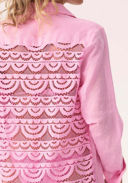 Wisteria Lace Millie Cover Up by PQ Swim, showcasing a playful pink tie-front shirt with a delicate lace back panel.