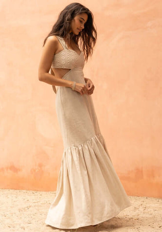 Marrakech Dress Sand by Sole Lisboa, showcasing a maxi dress with a sweetheart neckline and peplum bottom.