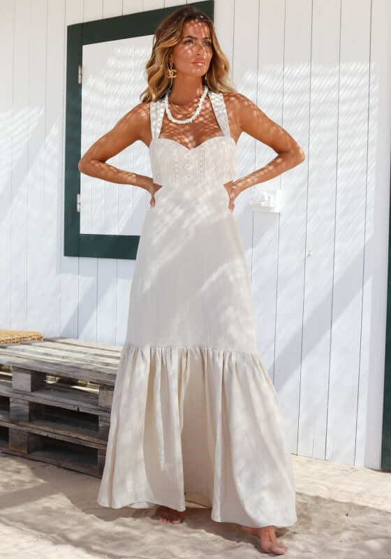 Marrakech Dress Sand by Sole Lisboa, featuring a flattering sweetheart neckline and cross-back tie, perfect for warm-weather escapes.