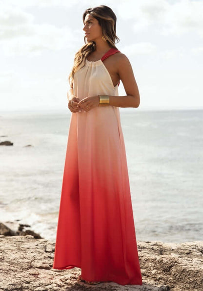 Santorini Dress Sunset Ombre Red by Sole Lisboa, a flowy maxi dress with ombre red tones by the beach.