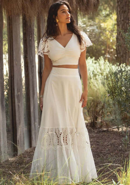 Portofino Skirt White by Sole Lisboa, showcasing a flowing long skirt with delicate cutouts, perfect for warm weather.