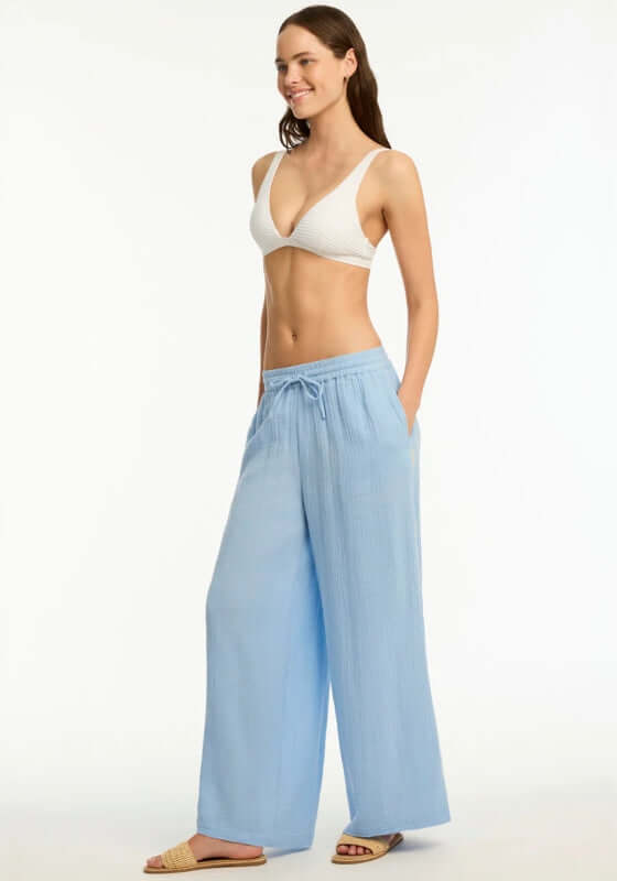Sunset Beach Pant Cornflower Blue by Sea Level, wide leg beach trouser in breathable fabric with drawstring waist.