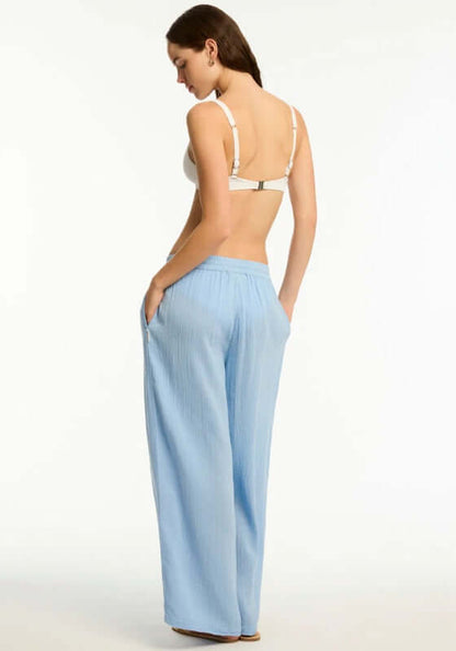 Sunset Beach Pant Cornflower Blue by Sea Level, showcasing breathable cotton beach pant with side pockets and wide leg.