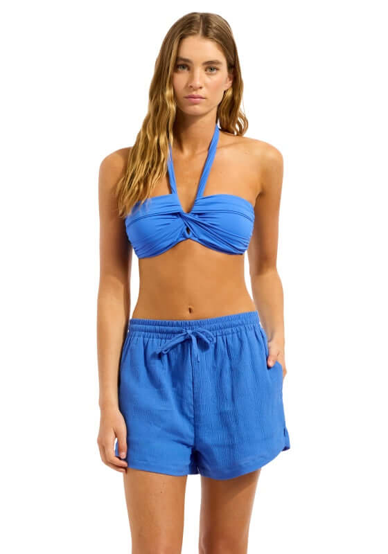 Sapphire Crinkle Beach Shorts by Seafolly worn with a stylish bikini, perfect for beach outings and summer fun.