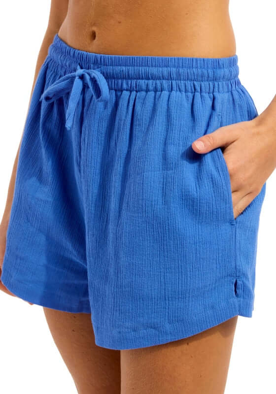 Sapphire Crinkle Beach Shorts by Seafolly, showcasing a close-up of the crinkle texture and light blue color.
