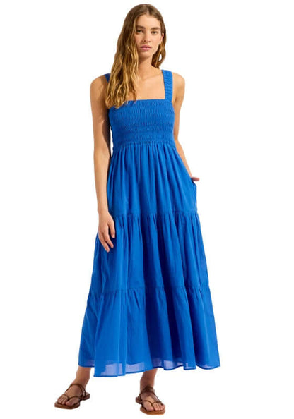 Faithful Midi Dress Sapphire by Seafolly, featuring a smocked top, thick straps, and a tiered skirt in vibrant blue.