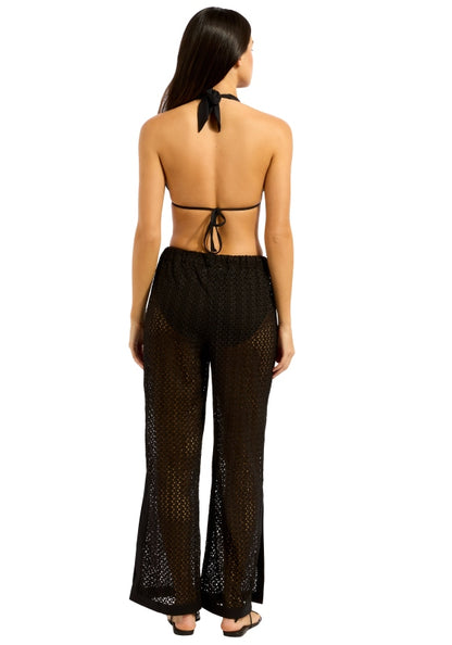 Side Split Beach Trousers Black by Seafolly, back view of model wearing stylish black crochet beach trousers.