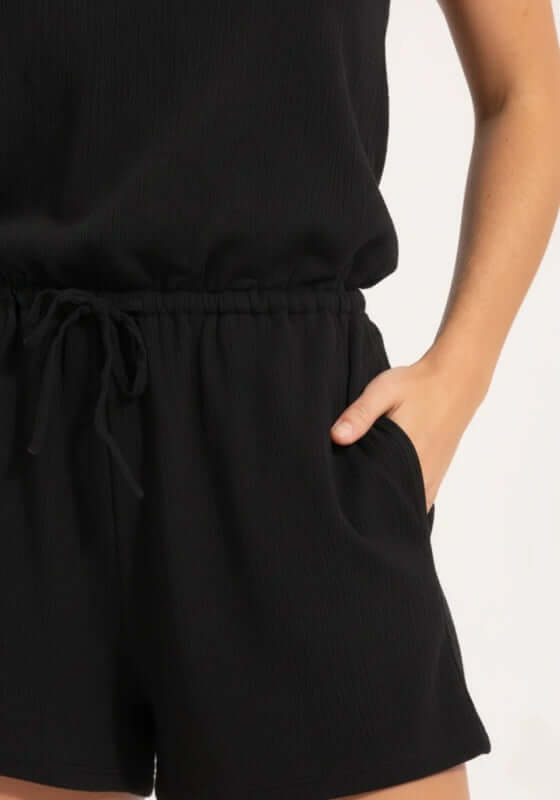 Crinkle Playsuit Black by Seafolly, featuring side pockets and a drawstring elasticated waist, made from soft crinkle cotton.