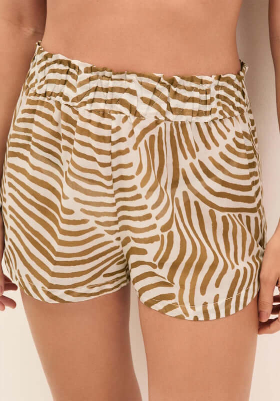 Lana Beach Short Nomad by Vix Swimwear featuring a relaxed fit with a stylish gold and white zebra pattern.