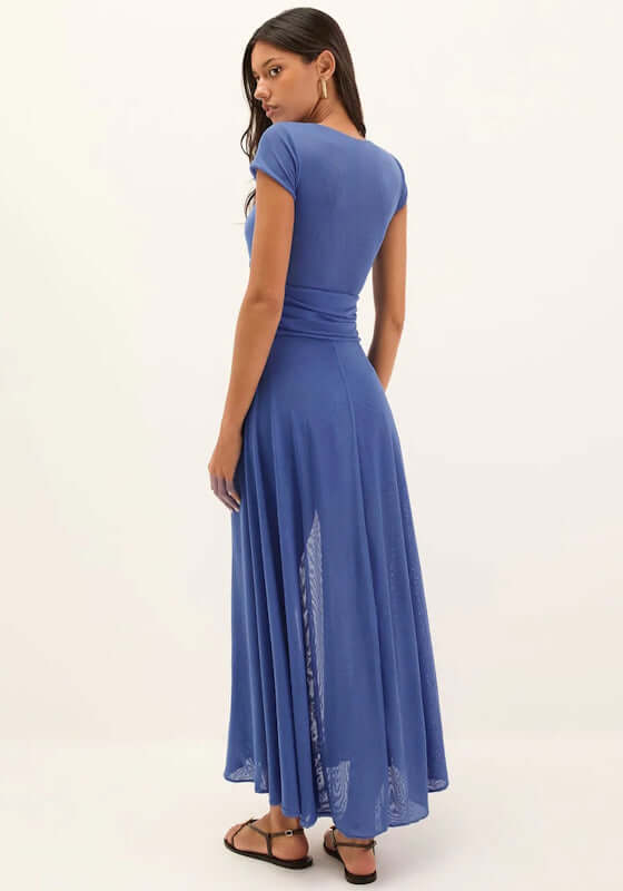 Maelly Midi Dress Wavesong by Vix Swimwear, showcasing the back of the elegant blue dress with flowing skirt.