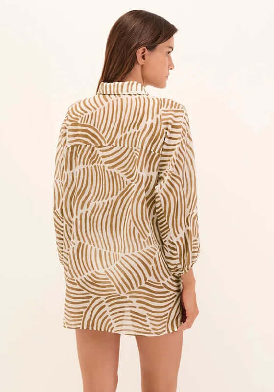 Moana Beach Shirt Nomad by Vix Swimwear, model showing the back view with a stylish abstract pattern.