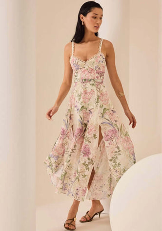 Iraso Long Dress Cream Botanic by Charo Ruiz, featuring a floral print design with spaghetti straps and a flowing skirt.