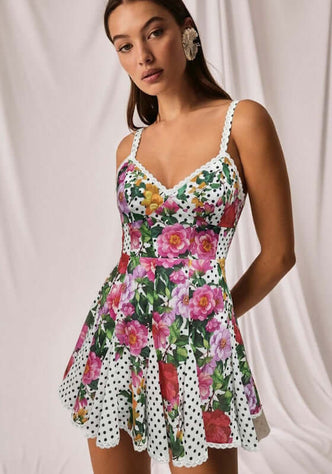 Folkadot Short Dress Rosela by Charo Ruiz, a mini dress with floral polka dots and a flattering V neckline.