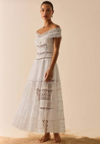 Amaira Dress White by Sole Lisboa, elegant off-shoulder long dress with lace detailing and structured bodice.