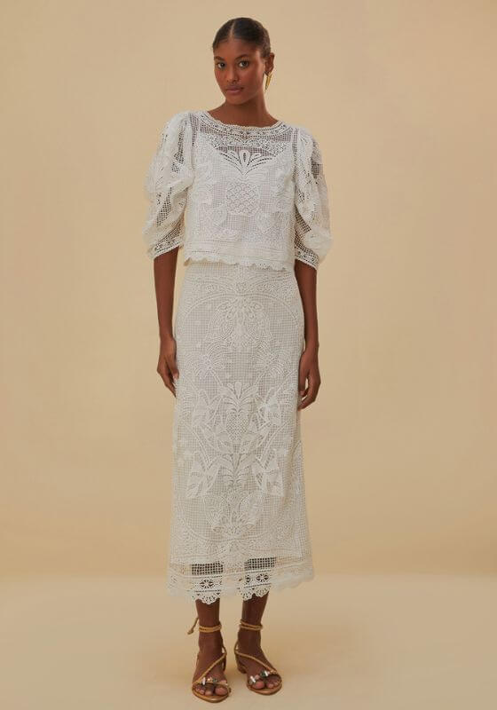 White Guipure Midi Skirt by Farm Rio, featuring a model wearing a stylish embroidered lace top and skirt combination.